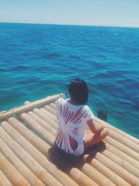 Scenic view of sea against blue sky
