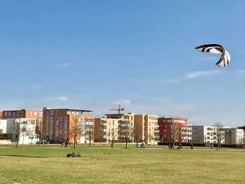 Man in park against clear sky