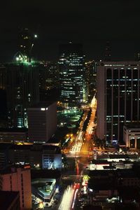 Illuminated cityscape at night