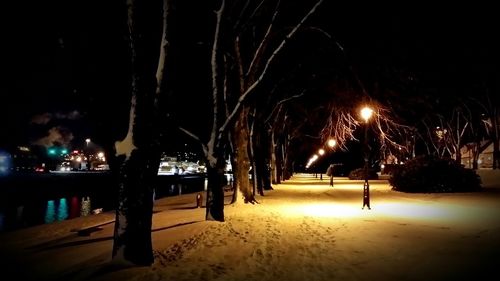 Illuminated street light at night