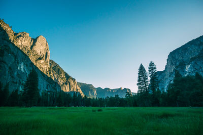 Panoramic view of landscape against clear blue sky
