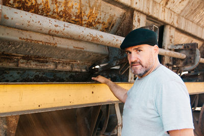 Adult man wearing flat cap