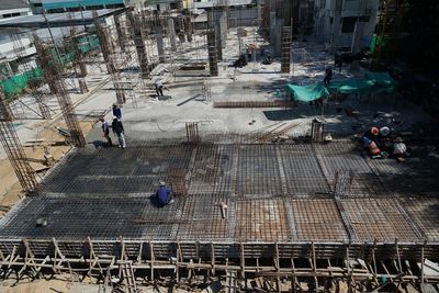 High angle view of workers working at construction site