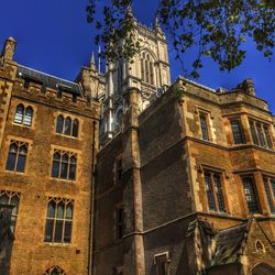 Low angle view of building against clear blue sky