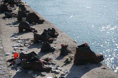 High angle view of shoes on beach