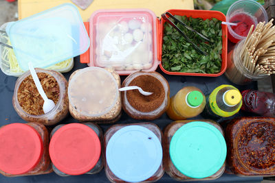 High angle view of multi colored containers