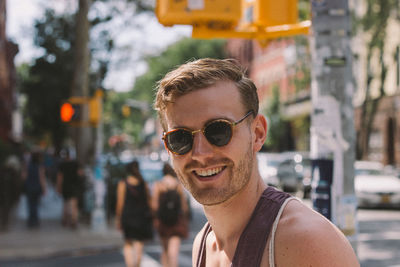 Portrait of young man wearing sunglasses
