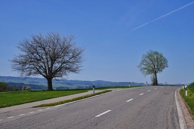 Road passing through field