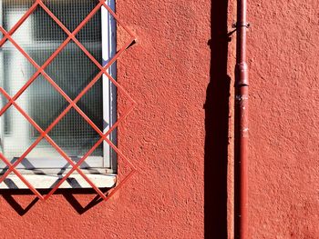 The window on the red wall