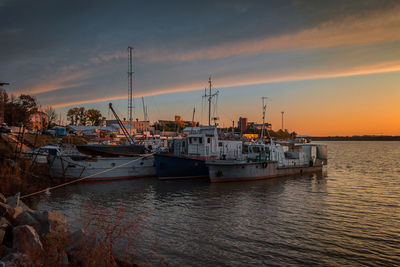 River boats in the parking lot in the evening.