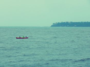 Boat sailing in sea