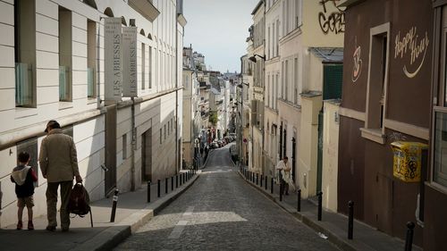 Narrow alley along buildings