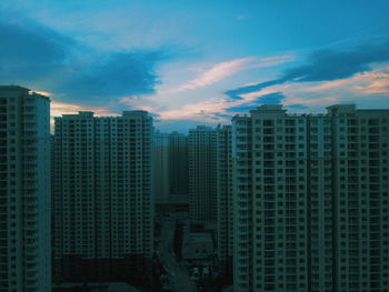 Modern cityscape against sky