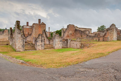 Old ruin building against cloudy sky