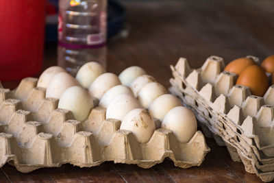 High angle view of eggs in container at market