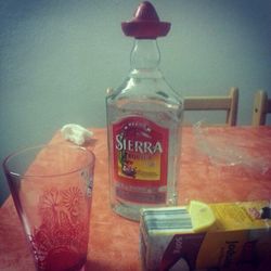 Close-up of drink in jar on table