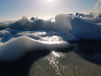 Scenic view of frozen sea against sky