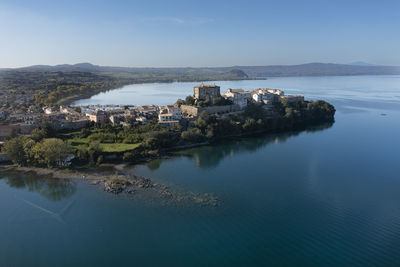 Aerial view of the town of capodimonte on lake bolsena