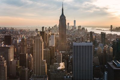 View of cityscape against sky during sunset