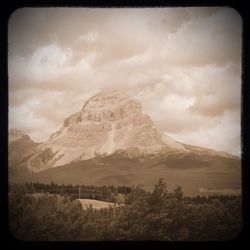 Scenic view of rocky mountains against sky