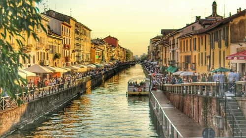 Canal amidst buildings in city