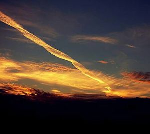 Scenic view of landscape against sky at sunset