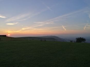 Scenic view of landscape against sky during sunset