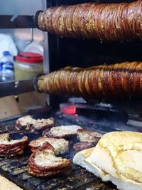 Close-up of meat on barbecue grill