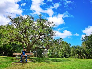 Man on field against sky