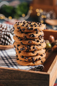 Close-up of cookies stacked on table