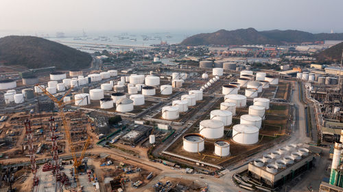 Aerial view industry factory oil and gas chemical tank and smoke with oil refinery plant zone 