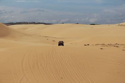 Scenic view of desert against sky