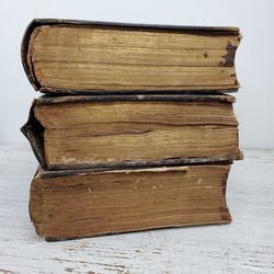 Close-up of books on wooden table