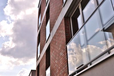 Low angle view of modern building against sky