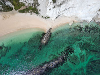 High angle view of water splashing in sea