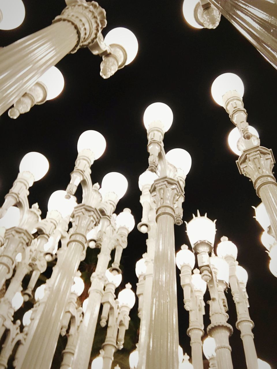 LOW ANGLE VIEW OF ILLUMINATED LIGHT BULB