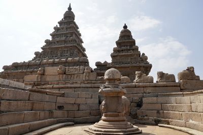 Statue of historic building against sky