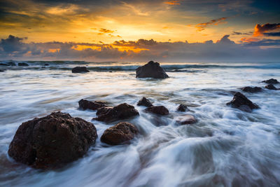 Scenic view of sea against sky during sunset