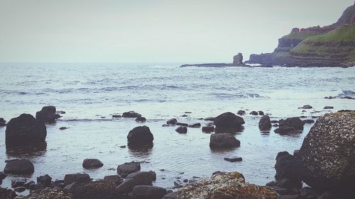 Scenic view of sea against clear sky