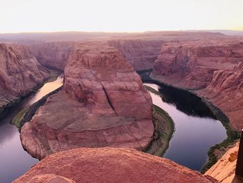 Scenic view of rock formations against sky