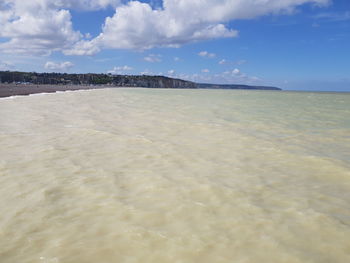 Scenic view of beach against sky