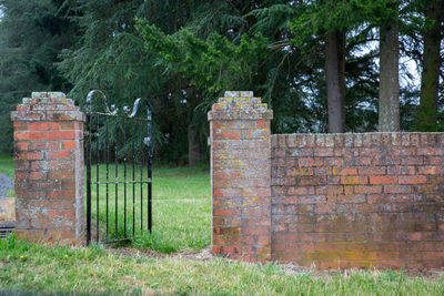 View of stone wall against trees