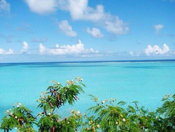 Scenic view of sea against cloudy sky