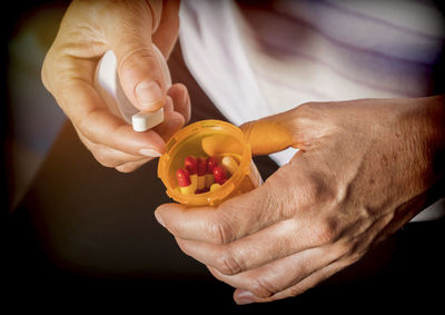 Close-up of man holding ice cream