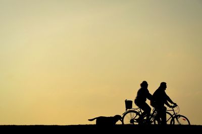 Silhouette man at sunset