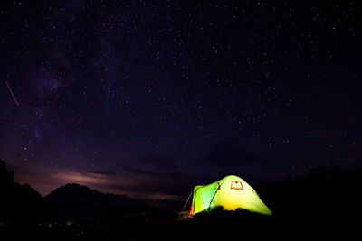 Low angle view of tent against sky at night