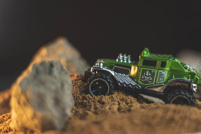 Close-up of toy car on field