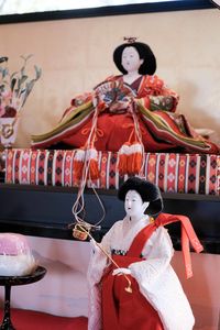 Portrait of young woman in traditional clothing