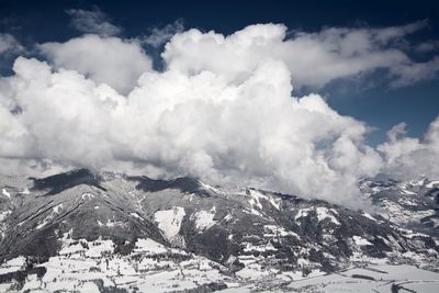 Scenic view of mountains against sky during winter