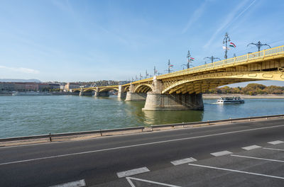 Bridge over river against sky